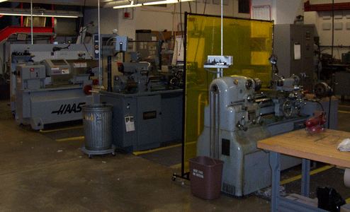 photo of Haas c n c lathe and two smaller lathes