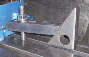 Notice the set up. The stud is closest to the clamped part,the strap clamp is higher on the stand-off end