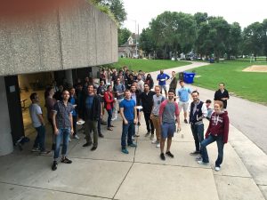 a few dozen students at a park