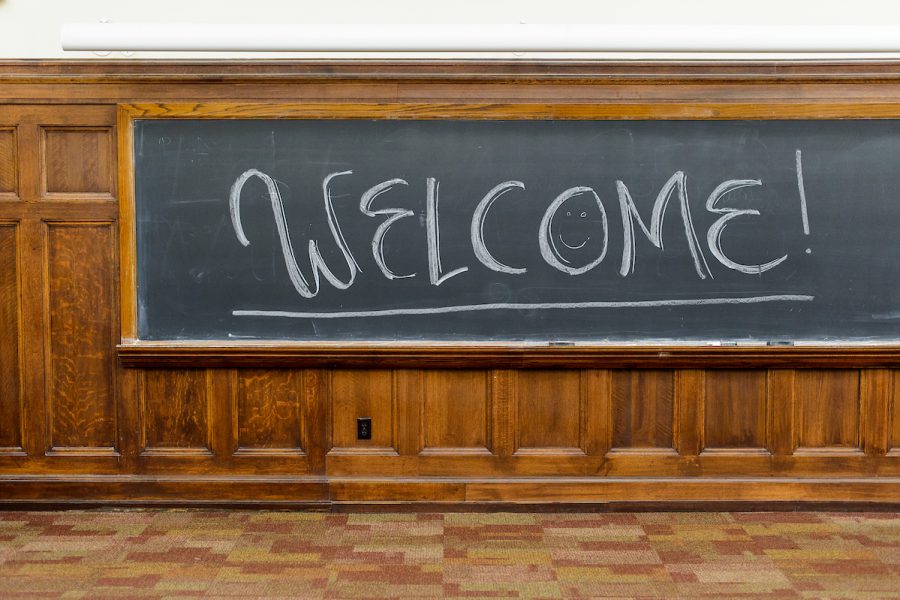 a chalkboard has "WELCOME!" written on it