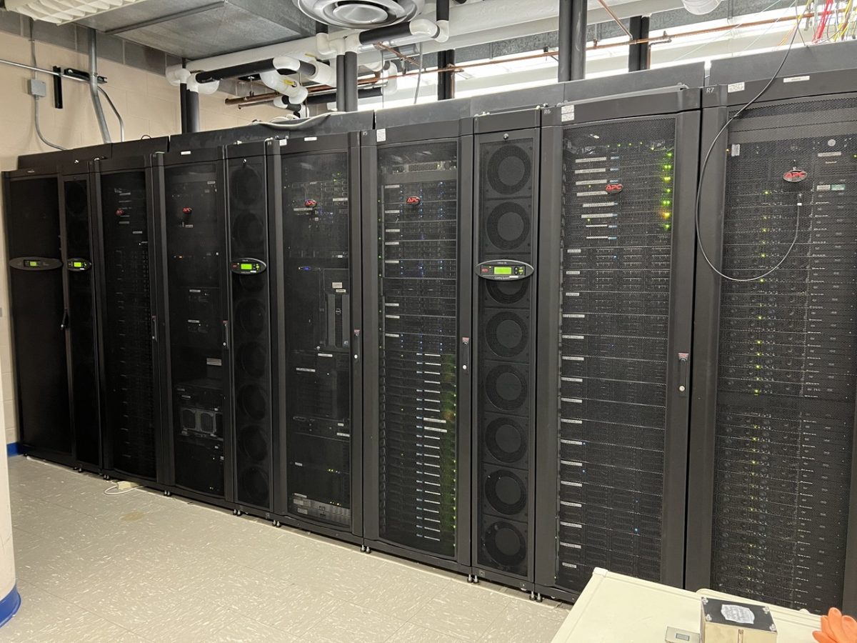 a long row of stacked computer servers