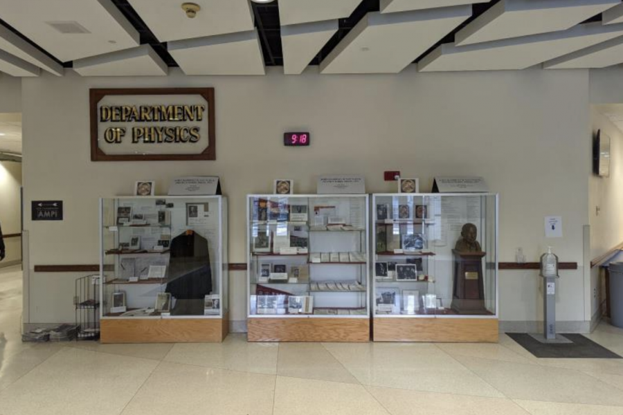a photo of the entry wall visitors see when they enter Chamberlin Hall, which currently has a display tribute to UW's Nobel Prize winner, Van Vleck.