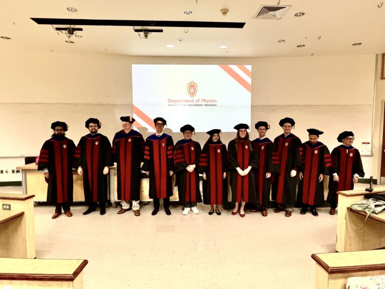 a group of people in graduation robes