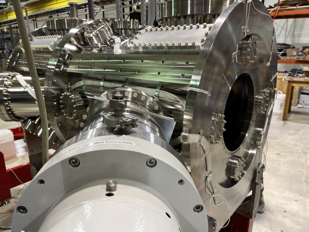 a series of metal cylinders connected together in a research lab