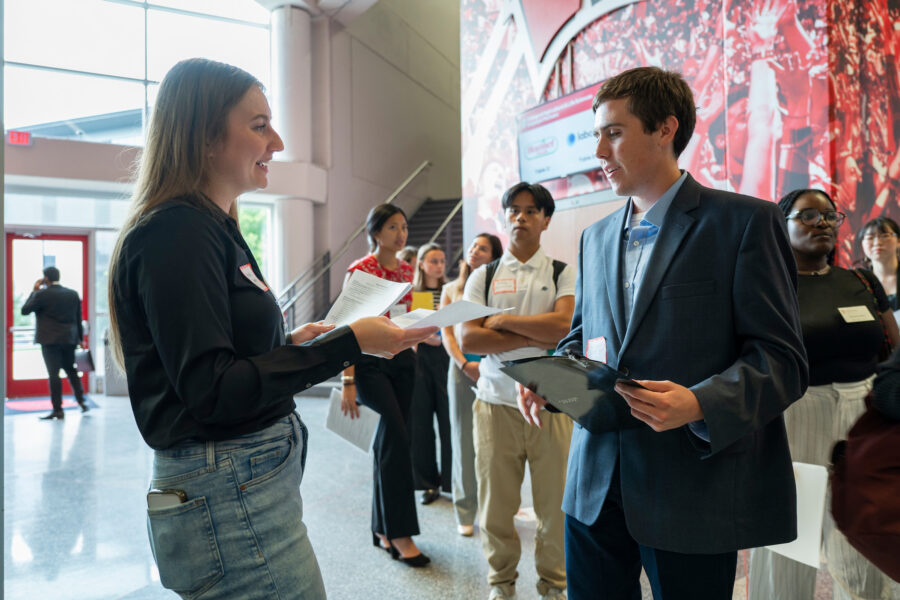 two people at a career fair network